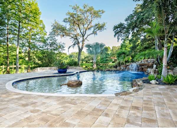 Install landscaping around pool